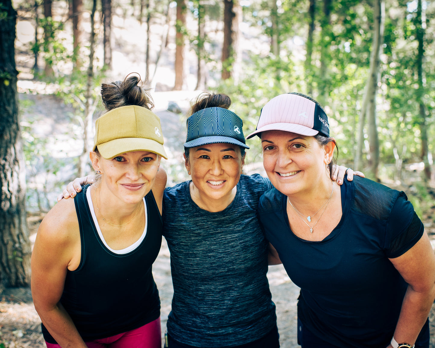 Athletic and motivated in our adjustable fit sun protecting visor. Unique ultimate trail running and ultra running fashion. Flattering and rare custom visors with cooling sweat bands and light weight hiking gear. Perfect her gift for a bug hair, messy buns. Necessary for hiking, snowshoeing, crystal hunting, softball, golfing, festival, volleyball, camping. Hat alternative. Free the bun