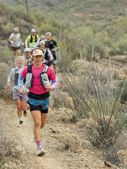 Neon high visor worn by kilian korth running in cocodona 250 ultra