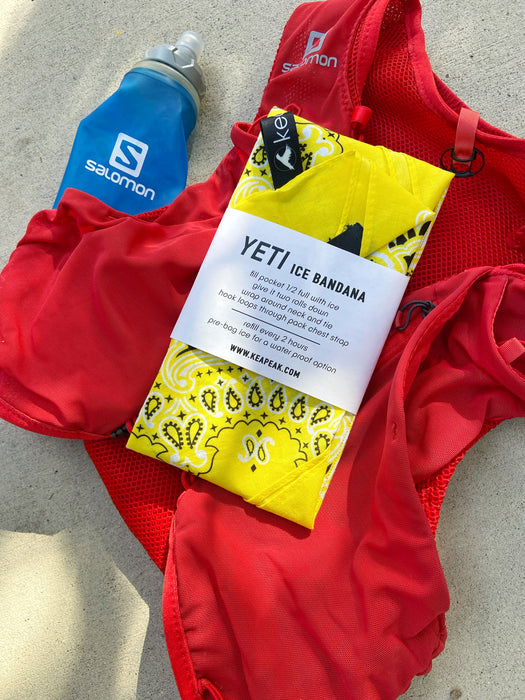 Yellow bandana modified to hold ice for running